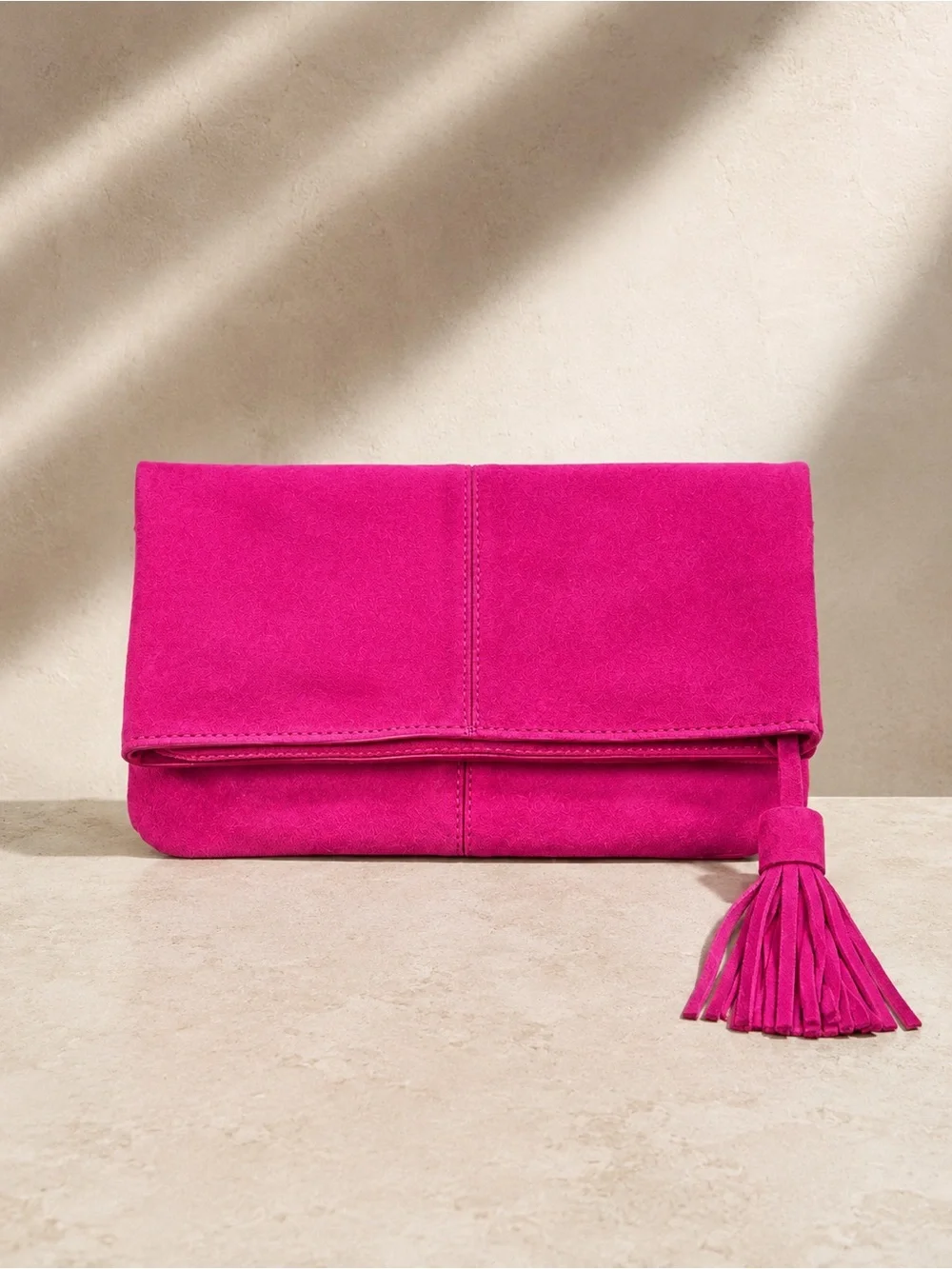 Fuchsia Suede Leather Foldover Tassel Clutch